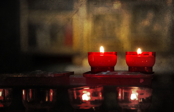 Candle burning in church - Vintage dirty look - Photo, Image
