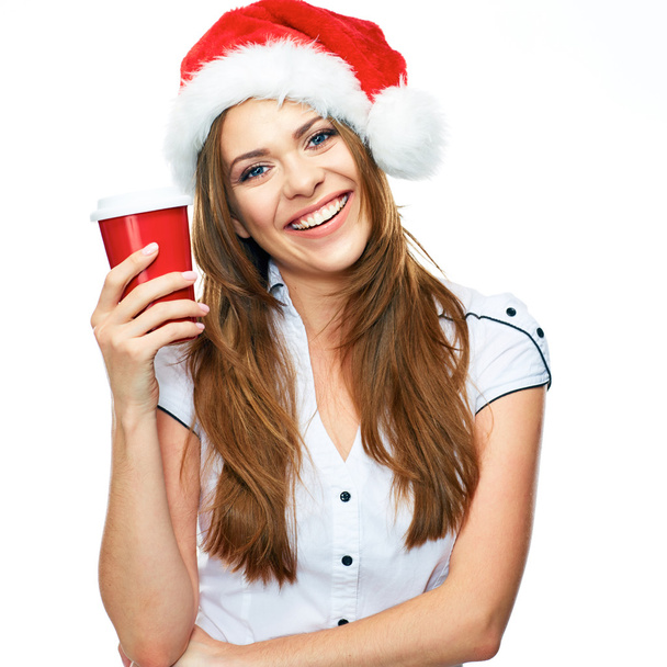 Woman in Santa hat with coffee cup - Foto, Bild