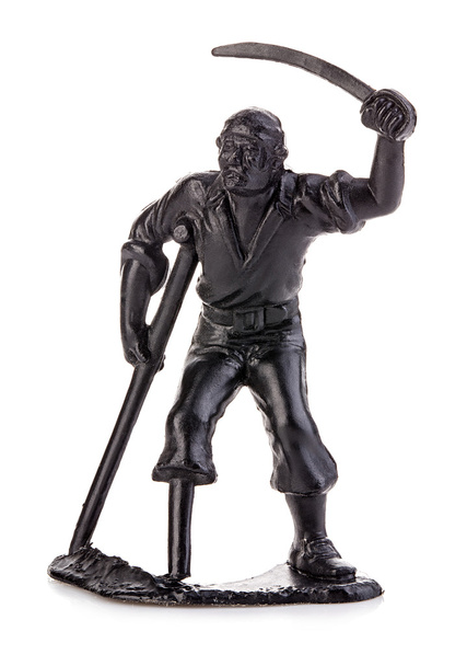 Arrabbiato pirata senza gambe con le stampelle con una sciabola. Statuetta in miniatura di un giocattolo per bambini
. - Foto, immagini