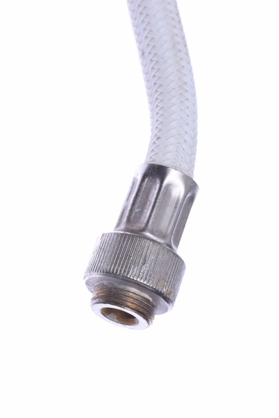 Flexible metal hose pipe isolated on with white background - Photo, Image