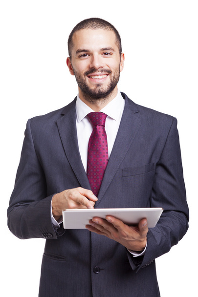 Happy smiling businessman with digital tablet - Photo, image