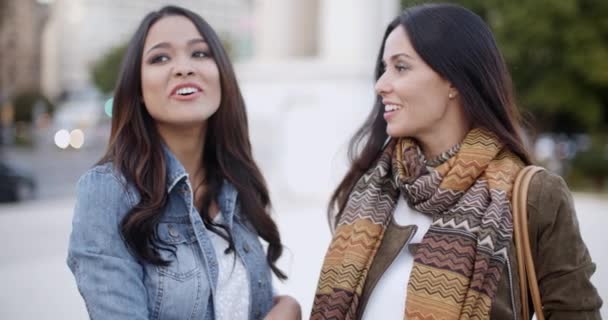 women chatting outdoors in a town - Video, Çekim