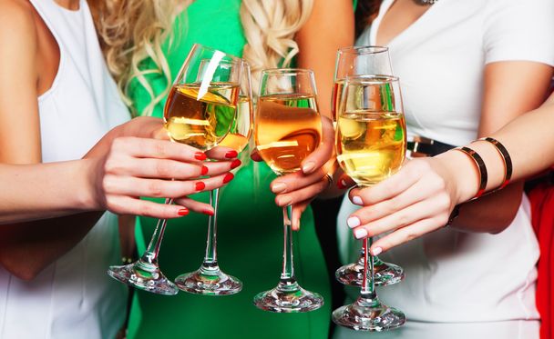 Group of partying girls clinking flutes with sparkling wine - Fotografie, Obrázek