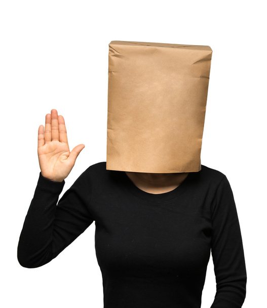young woman covering she head using a paper bag. Woman oath - Photo, Image