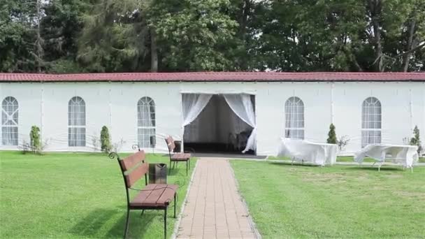 Summer tent restaurant. White marquee ready for outdoor wedding reception banquet - Footage, Video