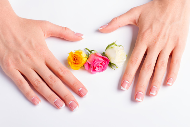 French lunar manicure with buds of roses. - Photo, Image