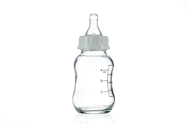 Baby milk bottle isolated on white background - 写真・画像