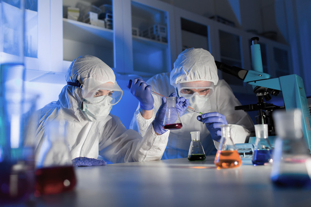 close up of scientists making test in lab - Fotoğraf, Görsel