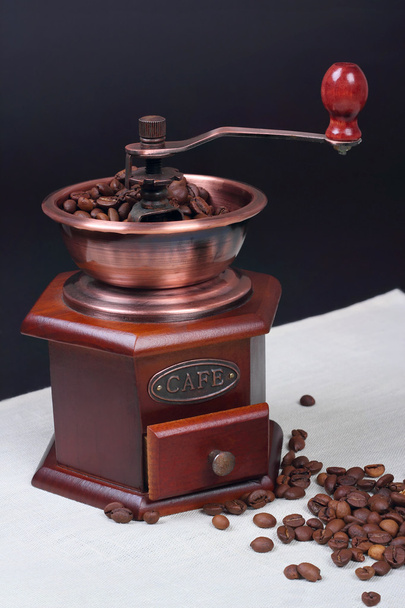 Still-life with a manual coffee grinder - 写真・画像