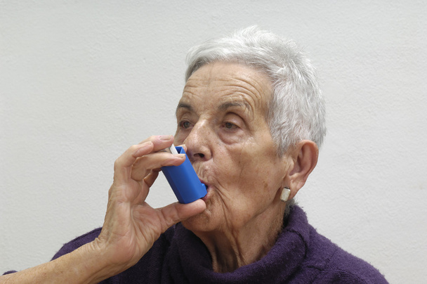old woman with an inhaler - Photo, Image