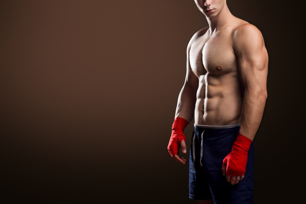 Muscular Fighter With Red Bandages - Photo, Image
