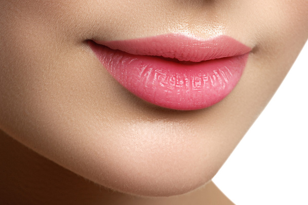 Perfect smile. Beautiful full pink lips. Pink lipstick. Gloss lips. Make-up & Cosmetics - Fotoğraf, Görsel