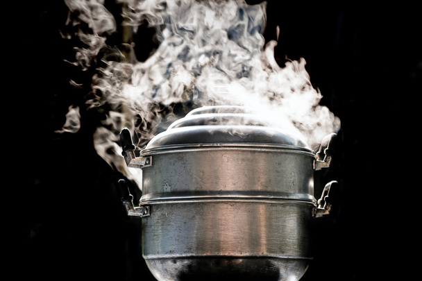 steam over cooking pot in kitchen - Photo, Image
