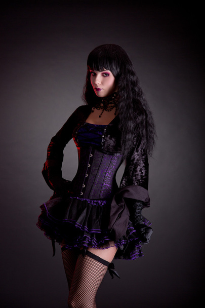 gothic girl in purple and black costume - Foto, Imagem