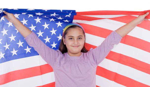 Patriotic little girl with american flag - Foto, afbeelding