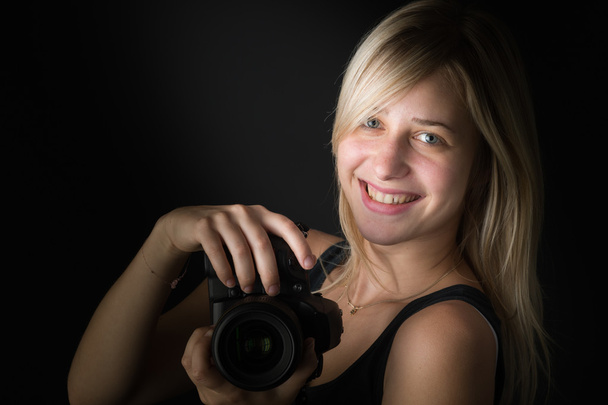  young woman with camera - Photo, Image
