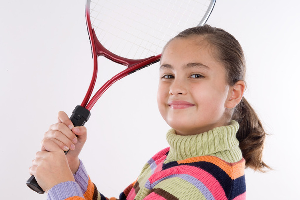 Girl with racket of tennis - Foto, afbeelding