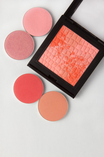 Pink and coral pressed blush on the makeup table - Photo, Image