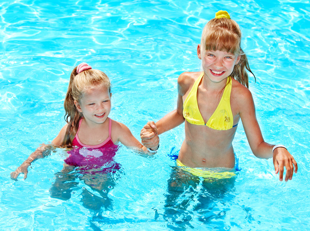 Children in swimming pool. - Photo, Image
