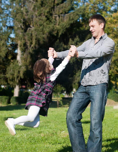 Father and daughter having a good time outdoor - Foto, Imagem