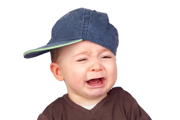 Hermoso bebé llorando con una gorra
 - Foto, imagen