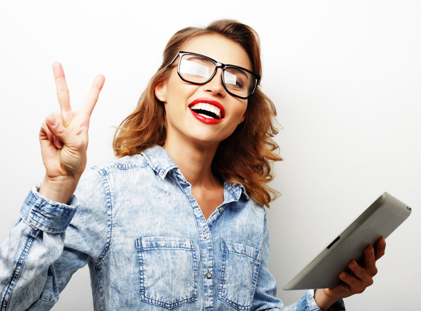 happy teenage girl wearing glasses with tablet pc computer - Фото, зображення
