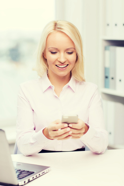 smiling businesswoman or student with smartphone - Zdjęcie, obraz