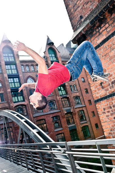 Jumping young man - Φωτογραφία, εικόνα