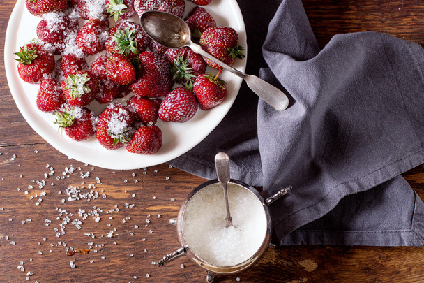 Garden strawberries with sugar and cream - 写真・画像