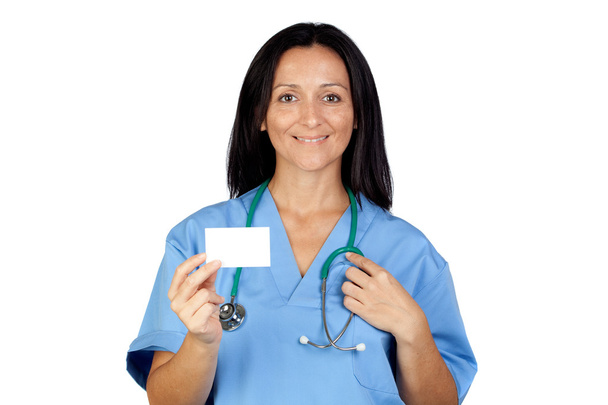 Brunette doctor with a blank card - Photo, image