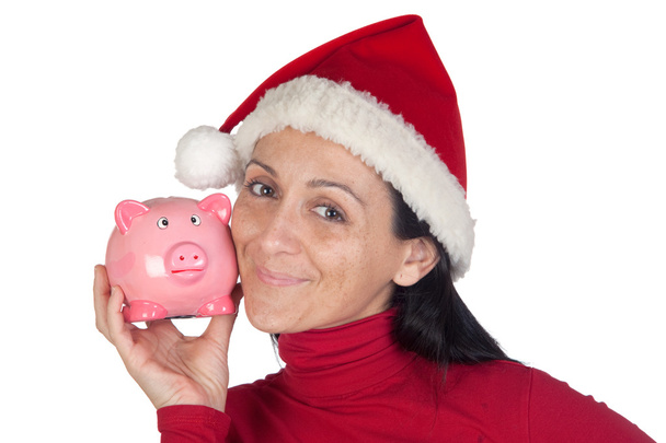 Beautiful girl in Christmas loving moneybox - Photo, Image
