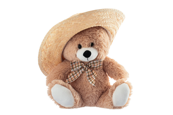 Urso de pelúcia fofo com chapéu de palha isolado em um backgro branco
 - Foto, Imagem