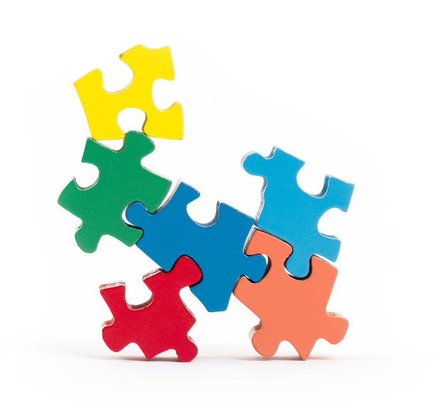 Closeup of big jigsaw puzzle pieces - Фото, изображение