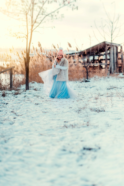 Pretty girl in winter with reed - Fotó, kép