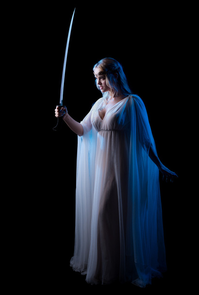 Young elven girl with sword - Valokuva, kuva