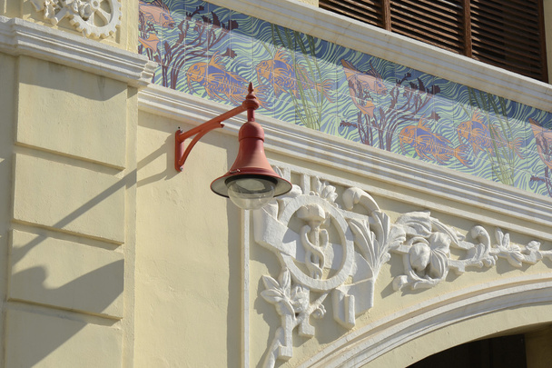 Lamp and mouldings on building in Valencia, Spain - Photo, Image