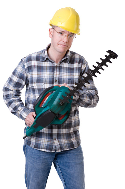 Gardener with hedge trimmer - Photo, image