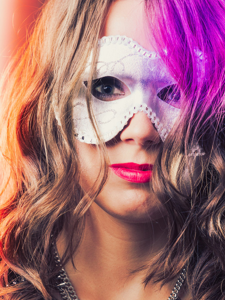 Woman with carnival venetian mask closeup - Фото, зображення