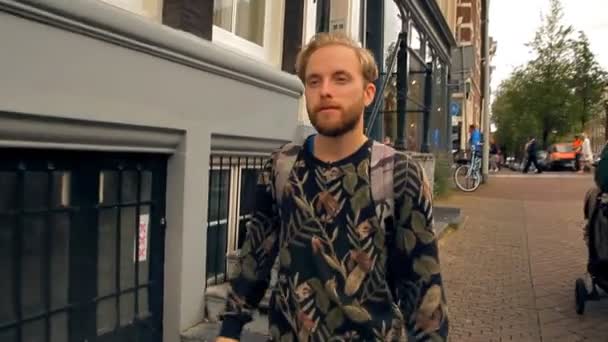 Hipster tourist is walking along European streets. - 映像、動画