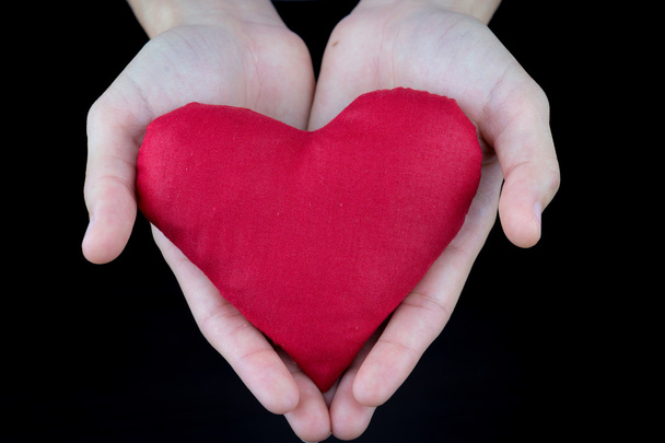 valentine's day concept, red heart in hands - Fotoğraf, Görsel