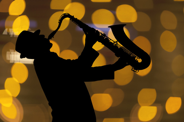 Saxophonist. Man playing on saxophone - Foto, Imagem