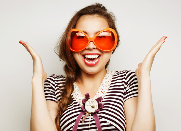 young woman with big party glasses - Foto, Imagem