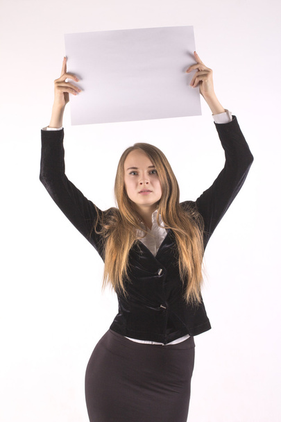 businesswoman holding blank billboard over her head  - Photo, Image