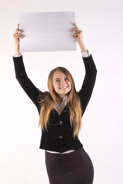 businesswoman holding blank billboard over her head  - Photo, Image