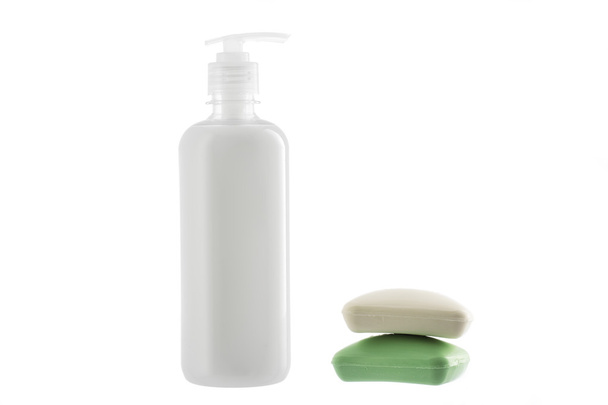 Bottle of liquid soap and two bars of soap isolated on white bac - Photo, Image