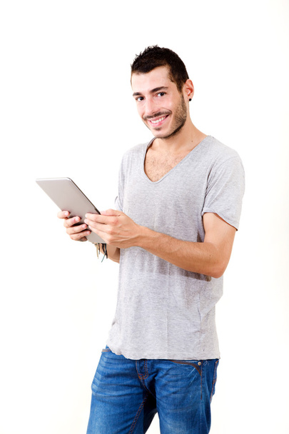 Young man using tablet - Φωτογραφία, εικόνα