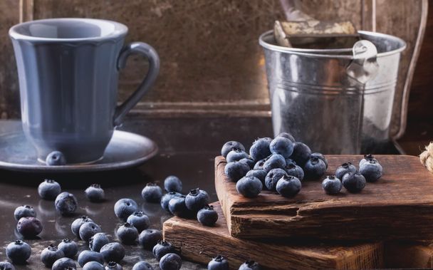 Blueberries on black metal background - Photo, Image