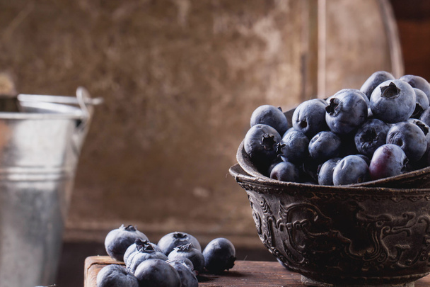 Blueberries on black metal background - Photo, Image