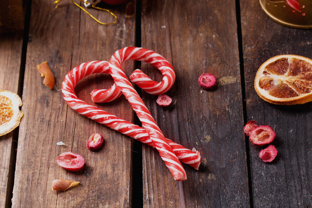 Christmas candies on rustic wooden board - Zdjęcie, obraz