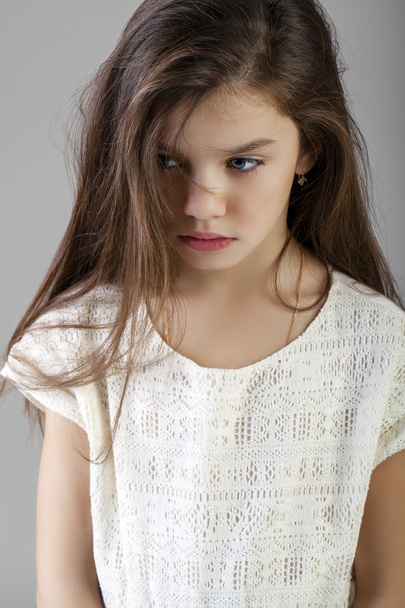 Portrait of a charming brunette little girl - Photo, image